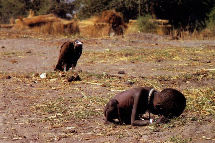 Starving Sudanese child being stalked by a vulture