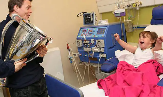 When Brian O'Driscoll, this girls hero, visited her in hospital.