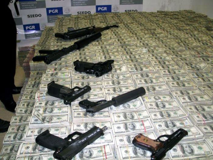 Guns and more cash hidden all over the house