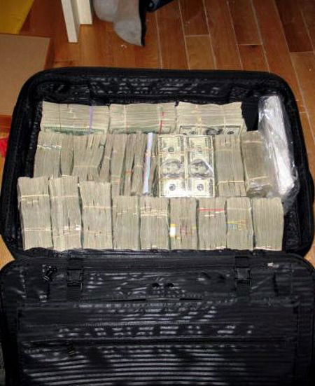 Additional 18 plastic bins filled with 100 dollar bills were discovered!
