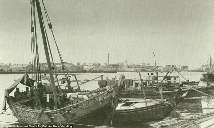 Dhows on the city creek which was once the centre of Dubai's pearl trade