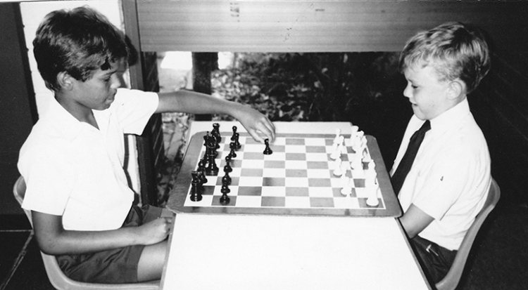 Heath Ledger on the right in a chess game