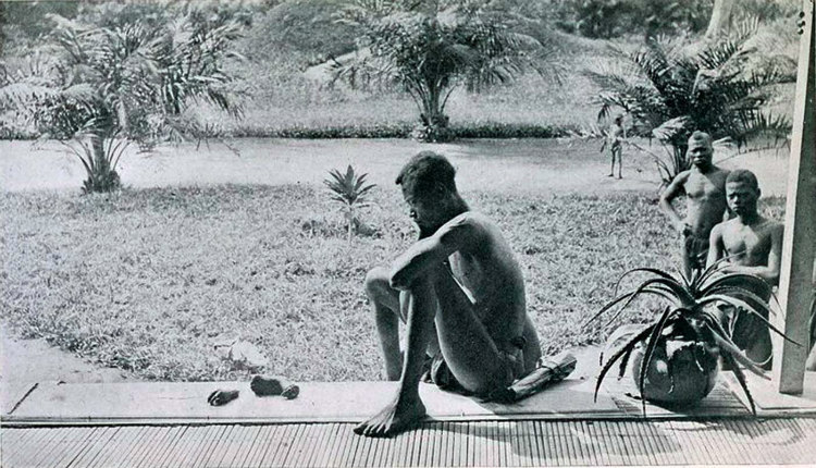 Congolese Man with Daughter's Hand and Foot