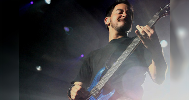 Mike Shinoda playing guitar