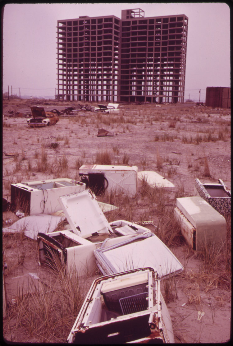 Old Refrigerators and Shell of Highrise at Breezy Point Highrise