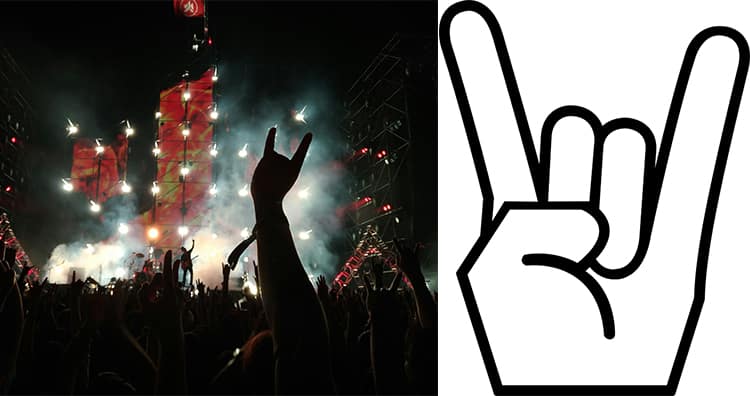 Audience showing horn sign gesture in rock band concert, Horn Sign Gesture