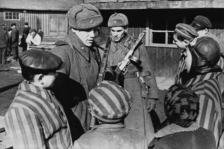 Soviet Soldiers Talking to Children at Auschwitz Just After Liberation