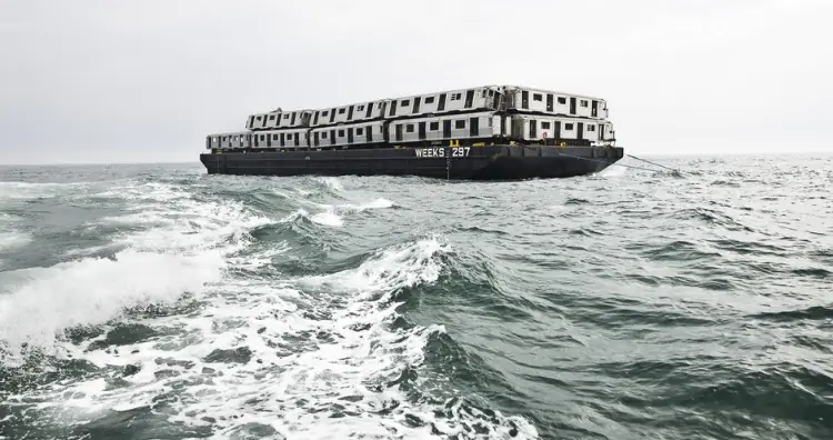 Subway cars on barges