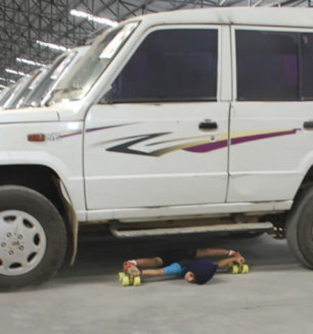 Picture Indian 5 year old girl skated under 27 cars and set up a world record