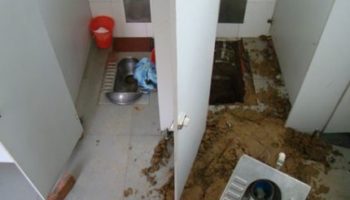 Picture In China baby survived by being accidentally flushed down the toilet.