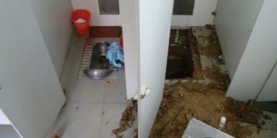 Picture In China baby survived by being accidentally flushed down the toilet.