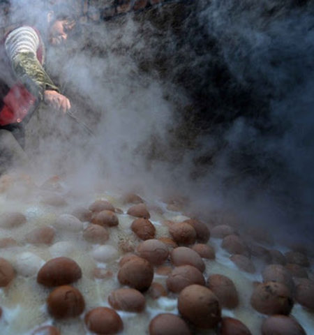 Picture Chefs in China make Urine Boiled Eggs.