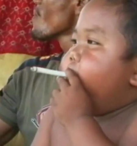 Picture Chain Smoking Baby Trades Smoking For Junk Food Addiction