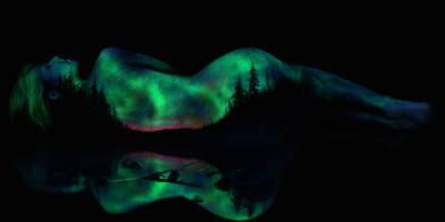 Picture Mesmerizing Fluorescent Bodyscapes Illuminated with a Black Light