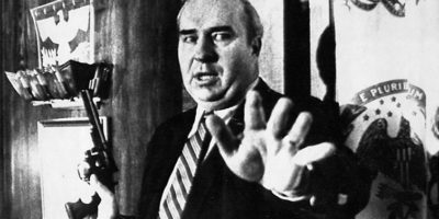 Picture In 1987, an American Politician named R. Budd Dwyer killed himself on national television by putting a gun in his mouth and pulling the trigger
