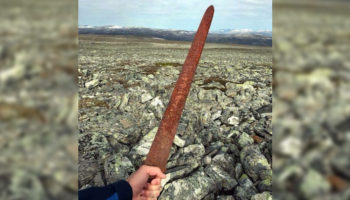 Picture Viking Sword Over 1,100 Old Discovered by Reindeer Hunters 5,400 Feet Above Sea Level