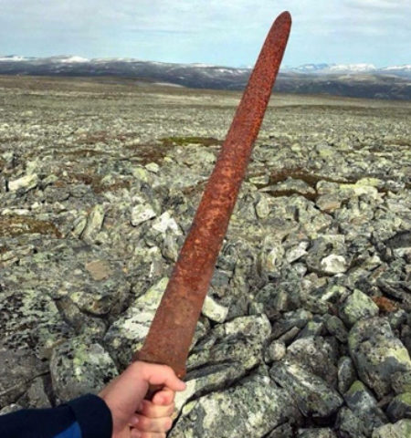 Picture Viking Sword Over 1,100 Old Discovered by Reindeer Hunters 5,400 Feet Above Sea Level