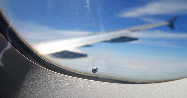 bleed holes of airplane window