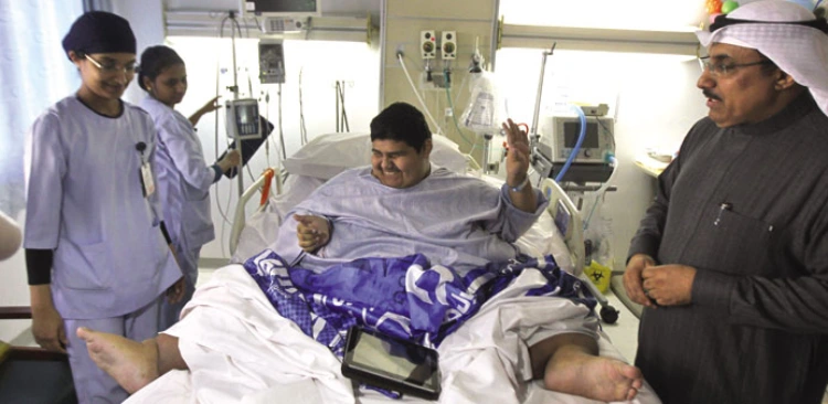 Khalid rests in a bed at King Fahad Medical City in Riyadh.