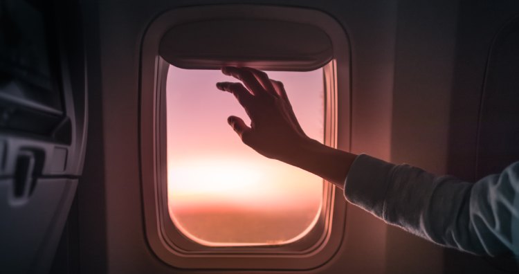 Raising airplane window blinds