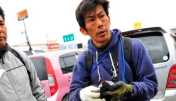 Picture Hideaki Akaiwa Swam over 600 Feet to Rescue His Family after Earthquake