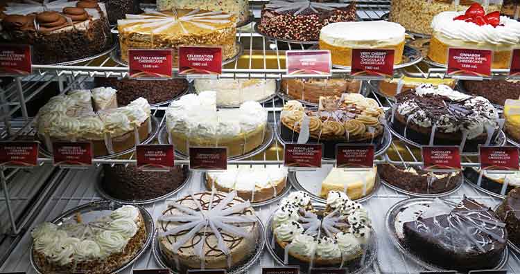 Assortment of cakes in display at 'THE CHEESECAKE FACTORY' 
