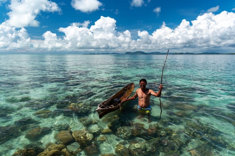 Bajau laut with his boat