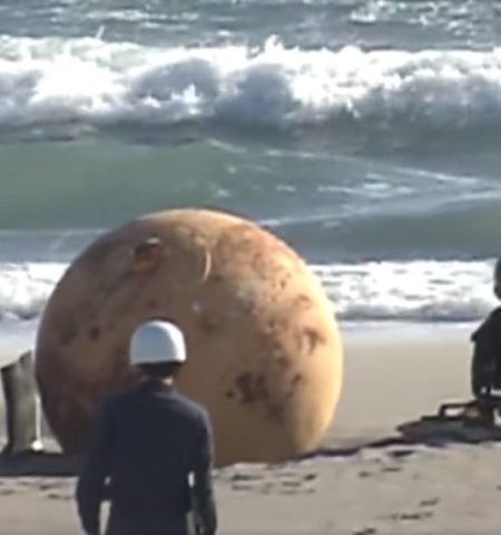 Picture Mysterious Metal Ball on Japan’s Pacific Shoreline Baffles Locals