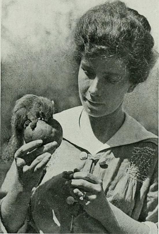 American woman with a pet squirrel