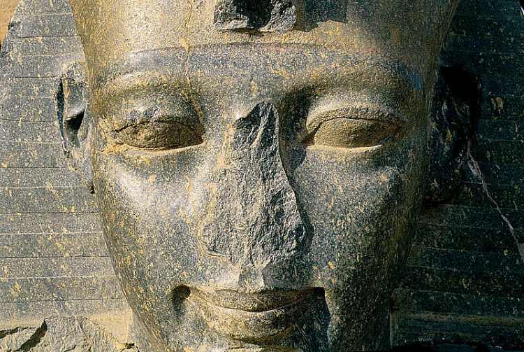 A noseless statue of Ramses II in the Ramesseum. Luxor, Egypt