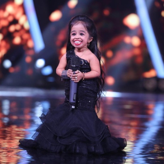 Jyoti Amge, the world's shortest woman, makes average-sized things look big.