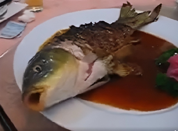 A dish where the fish is half dead and half alive.