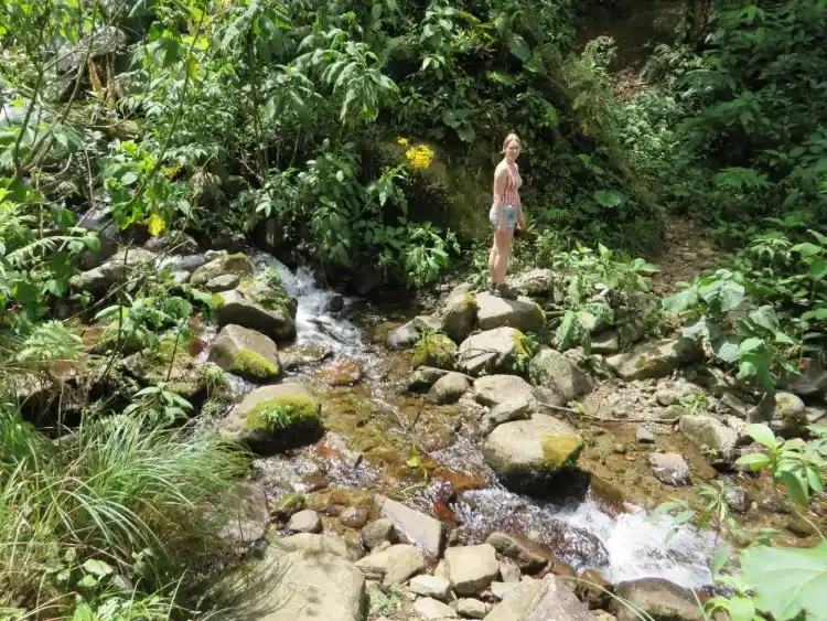 Kris crossing river before disappearance.